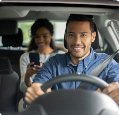 Man and woman in vehicle interior